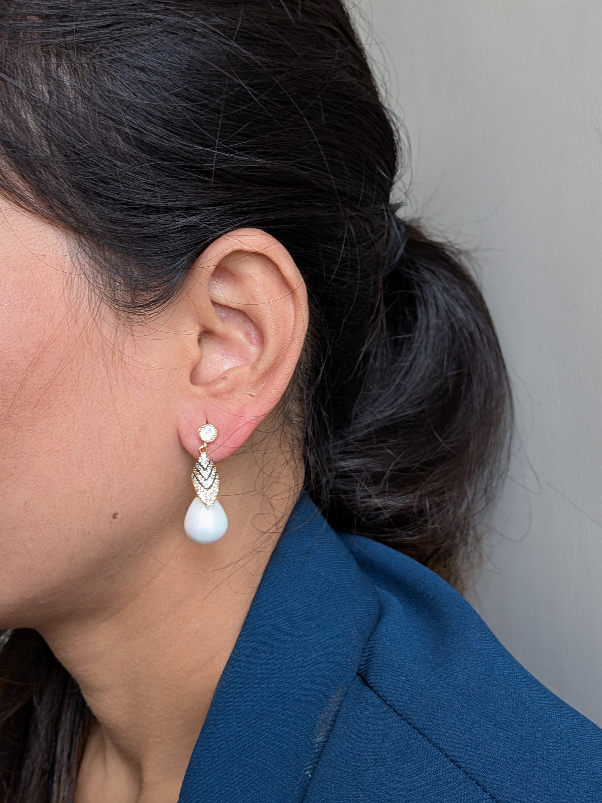 Royal Gleam Pearl Drops – crystal stud earrings with chevron zirconia and glossy teardrop pearls