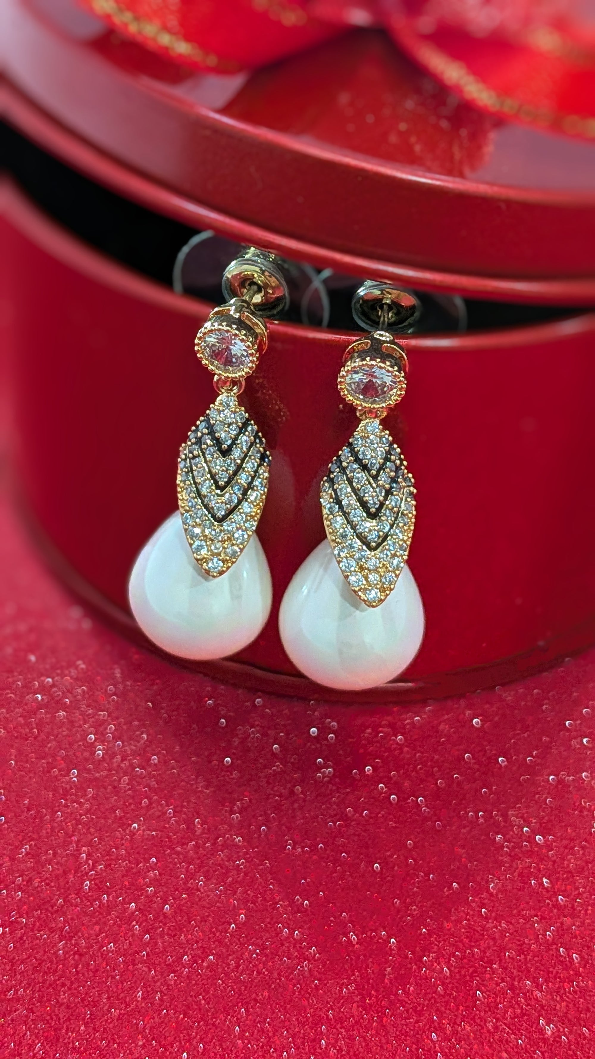Royal Gleam Pearl Drops – crystal stud earrings with chevron zirconia and glossy teardrop pearls