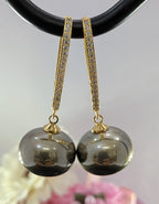 Gleam & Grace Hoops – gold zircon-encrusted hoop earrings with high-shine pearl drops