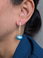 Gleam & Grace Hoops – gold zircon-encrusted hoop earrings with high-shine pearl drops