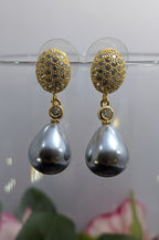 Twilight Pearl Drops – pave-set tops with teardrop grey pearls and connector stone