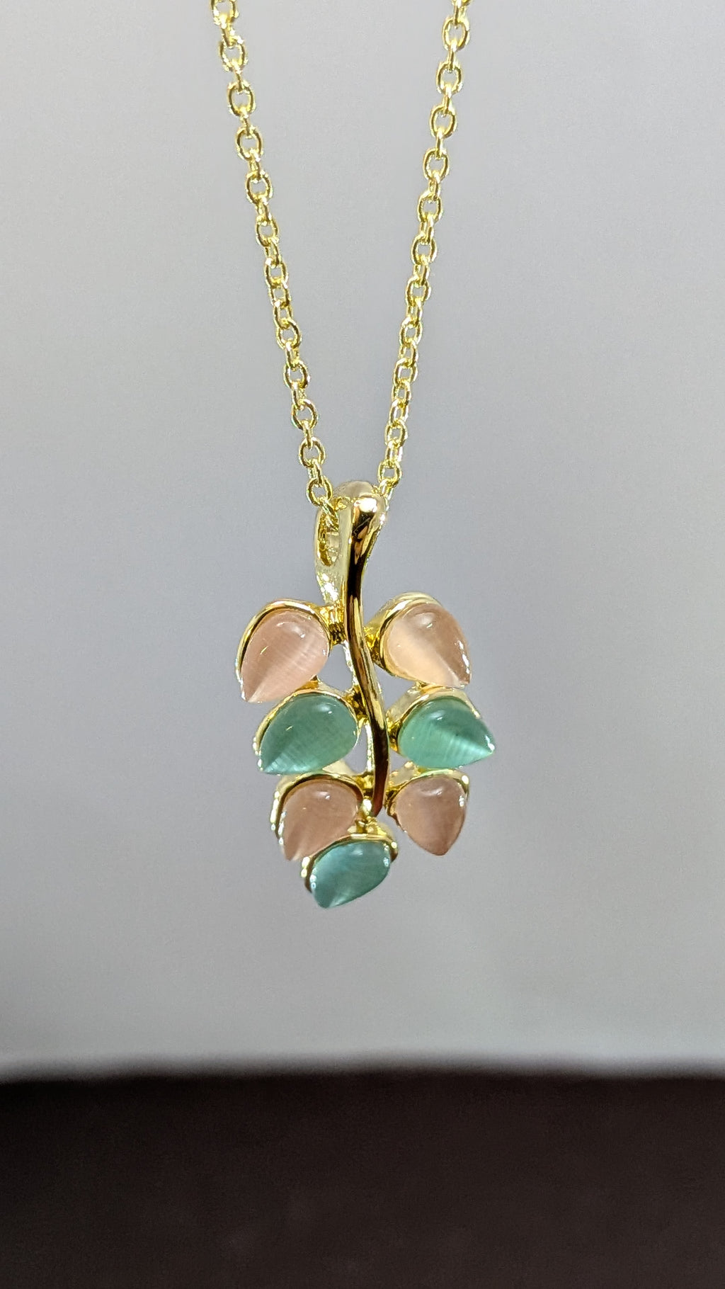 Pastel Bloom Leaf Pendant Set – pink and mint leaf stones on gold vine hanger