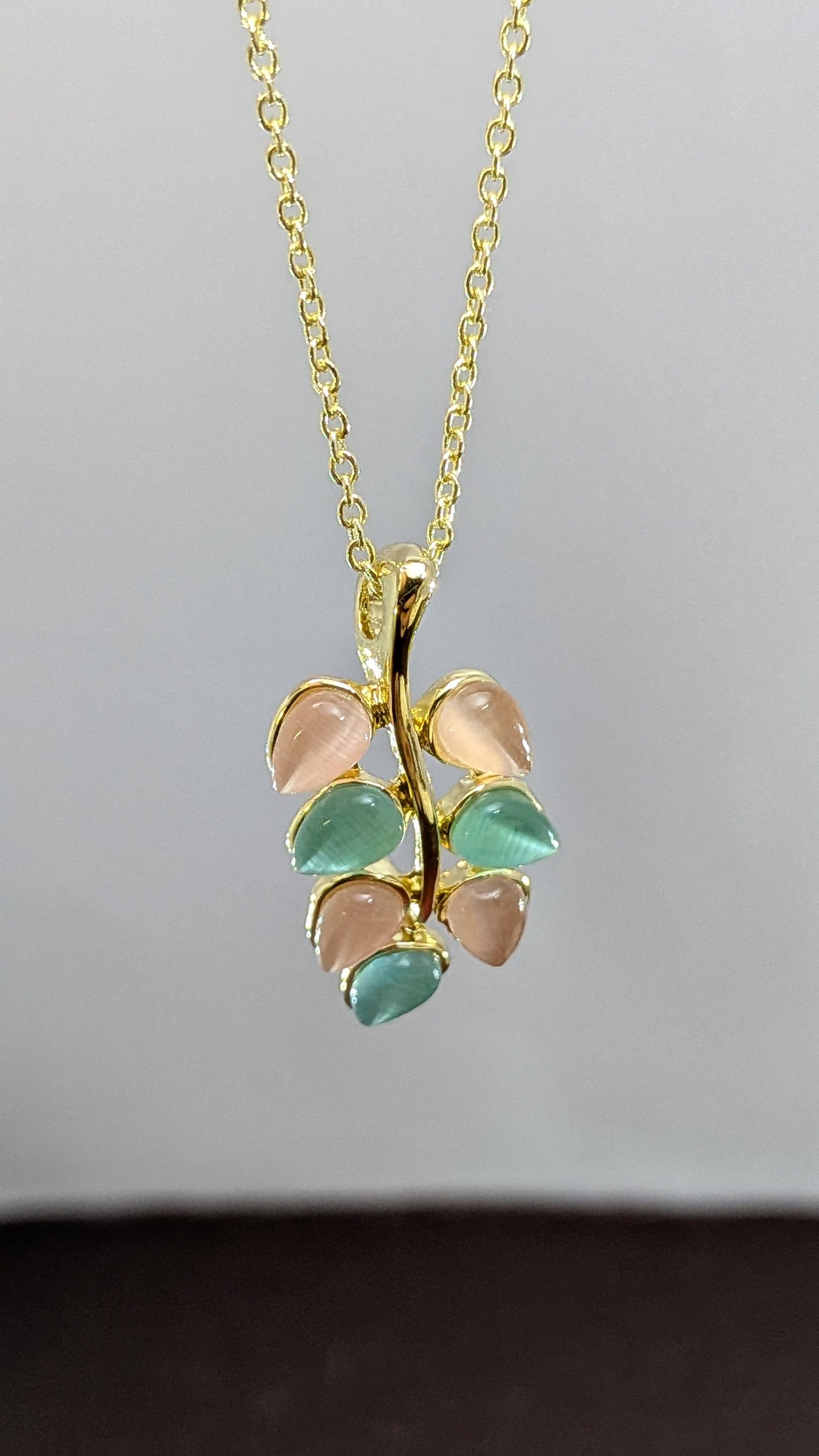 Pastel Bloom Leaf Pendant Set – pink and mint leaf stones on gold vine hanger