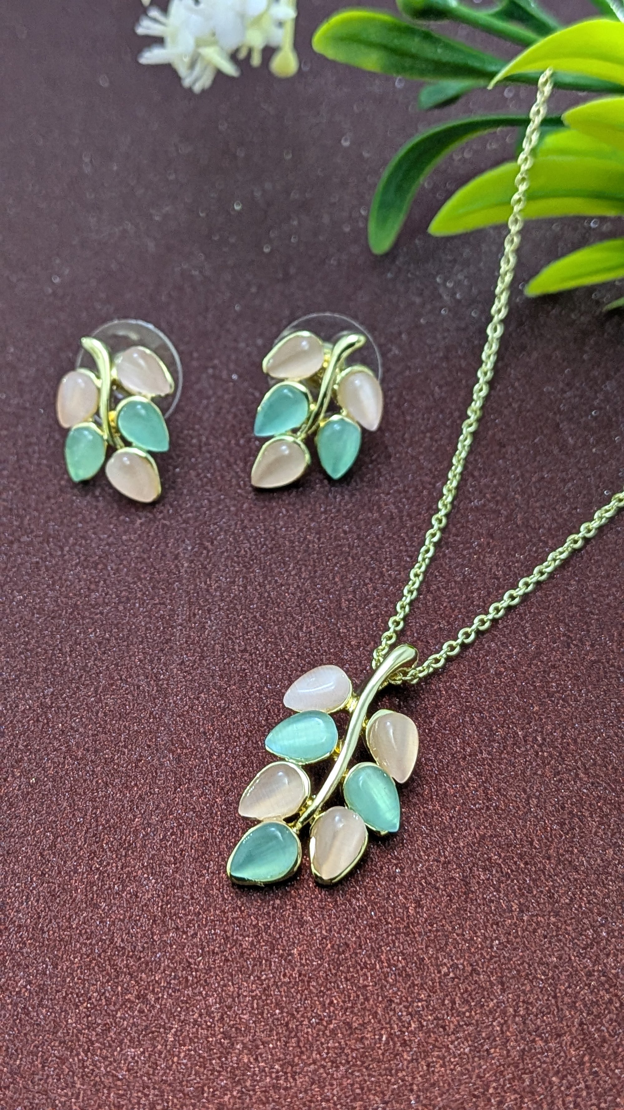 Pastel Bloom Leaf Pendant Set – pink and mint leaf stones on gold vine hanger