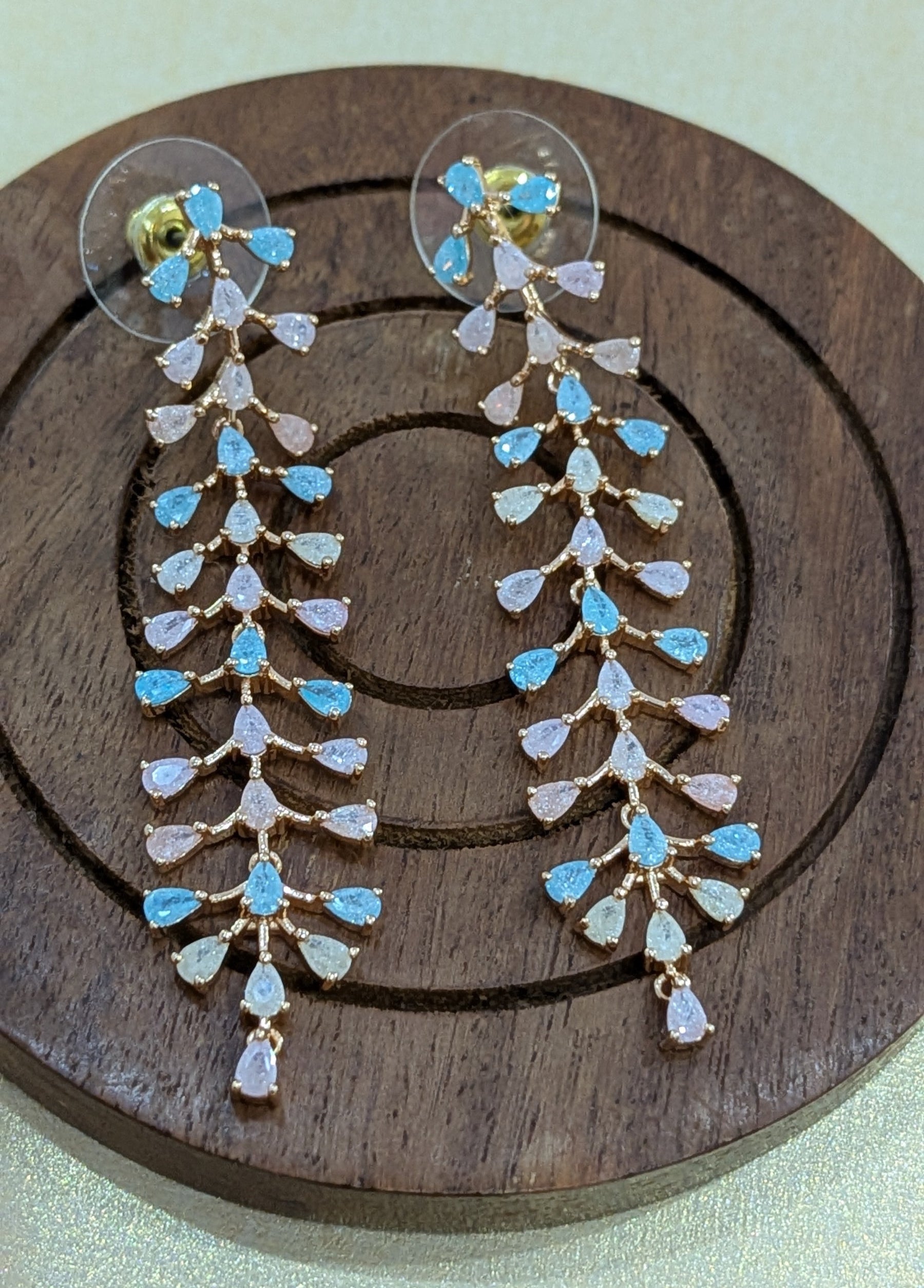 Pastel Bloom Vine – cascading pastel pink and blue stone earrings in gold tone