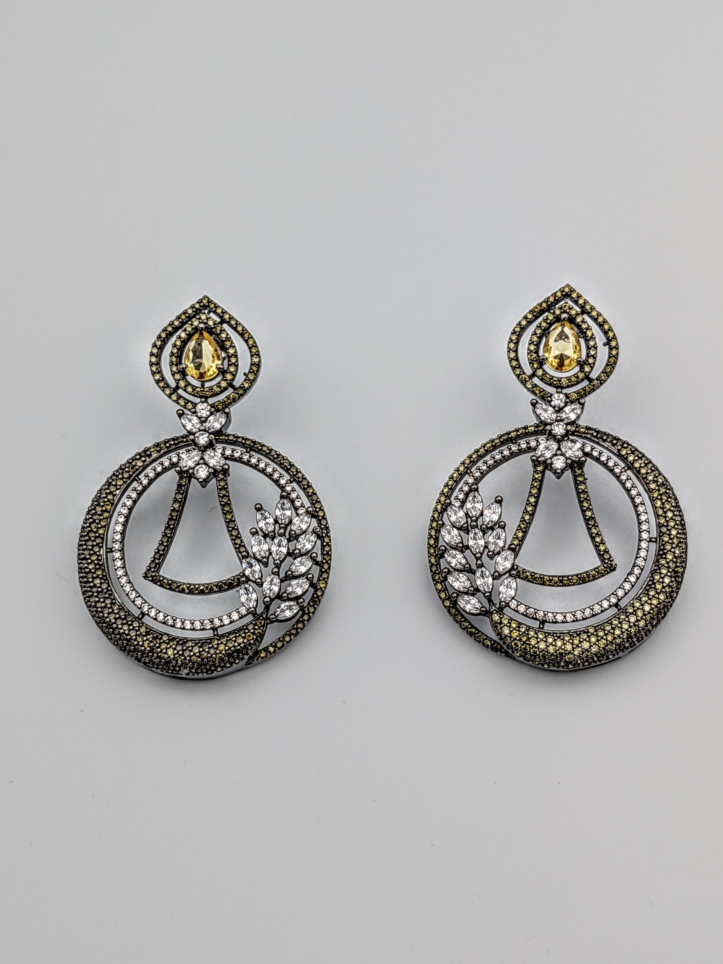 Antique two-tone drop earrings with teardrop yellow crystal, circular zircon detailing