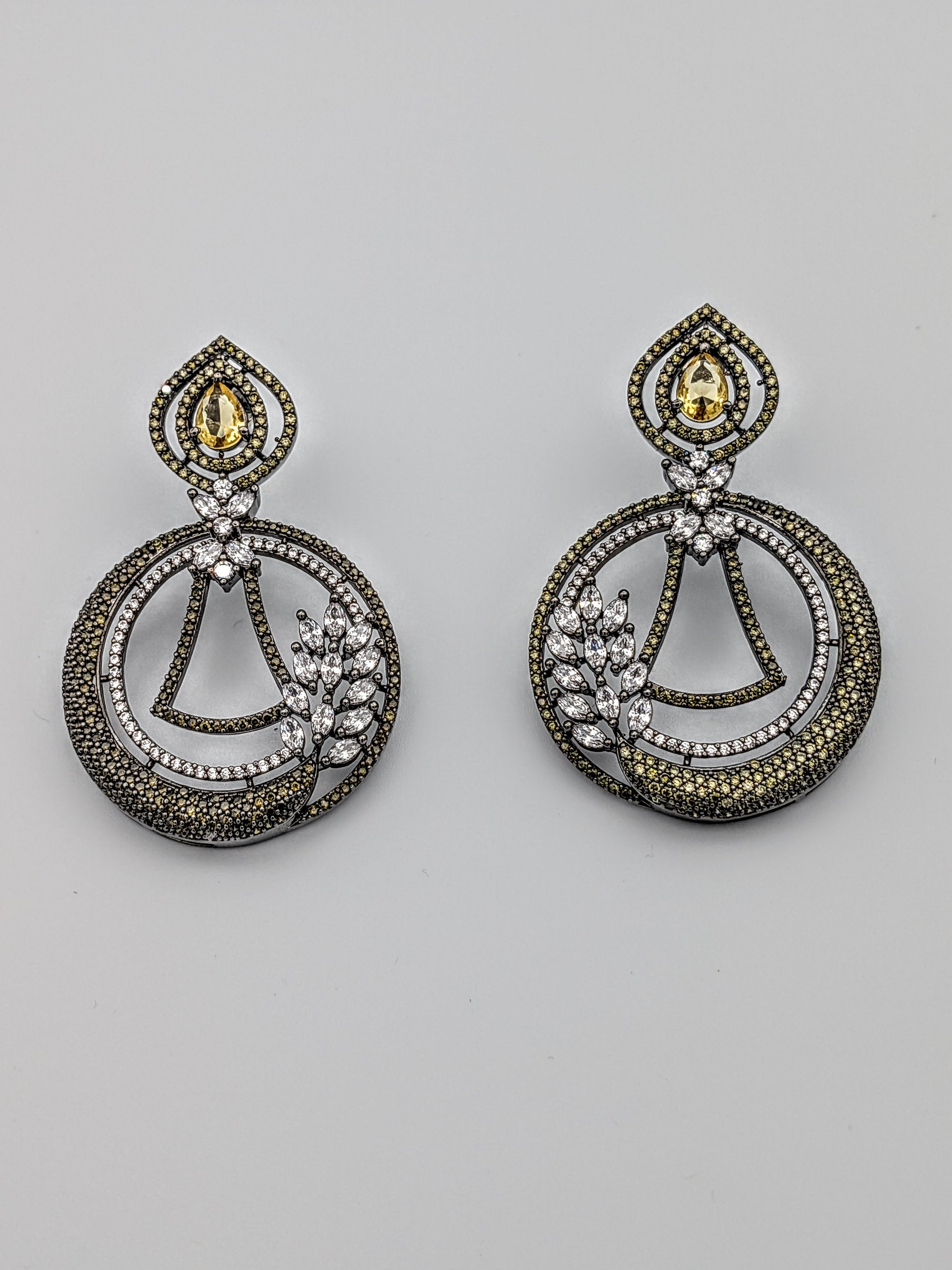 Antique two-tone drop earrings with teardrop yellow crystal, circular zircon detailing