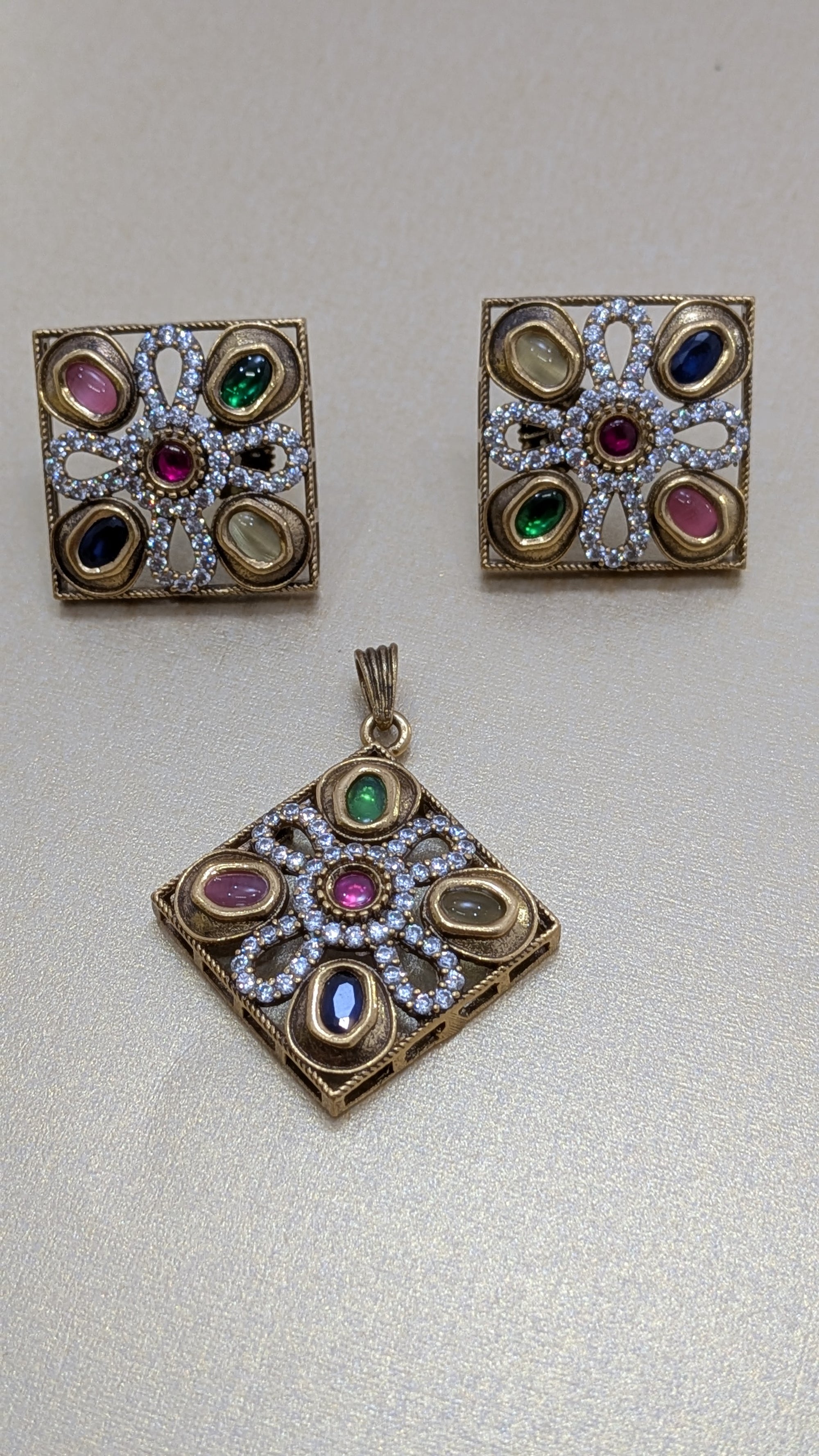 Navratna Harmony  pendant set from TreasureDrum Jewellery