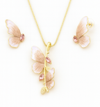Butterfly-shaped necklace with pink gemstones